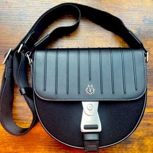 New Rimowa crossbody bag. Used once. Like new condition.